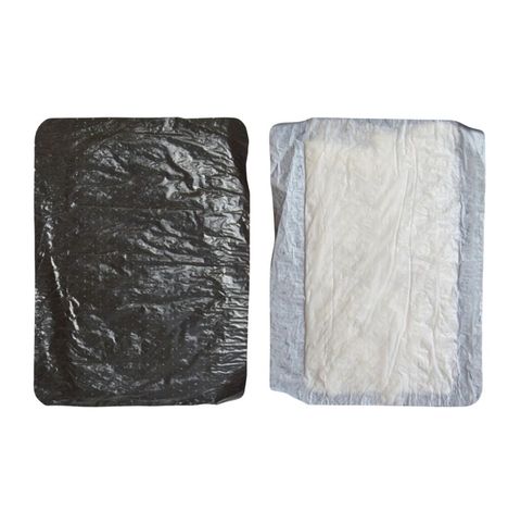 Left:  Top of Tray Liner - holes for drainageRight:  Bottom of Tray Liner - absorbant pad