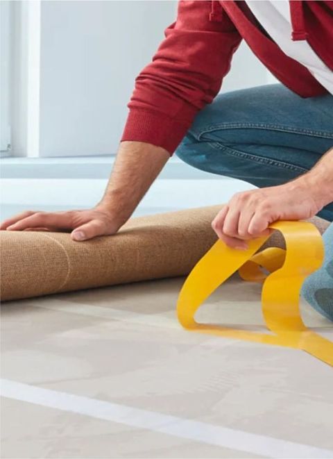 Double-sided-tape-gda-carpet-tape-being-used-image Double-sided-tape-gda-carpet-tape-being-used-image
